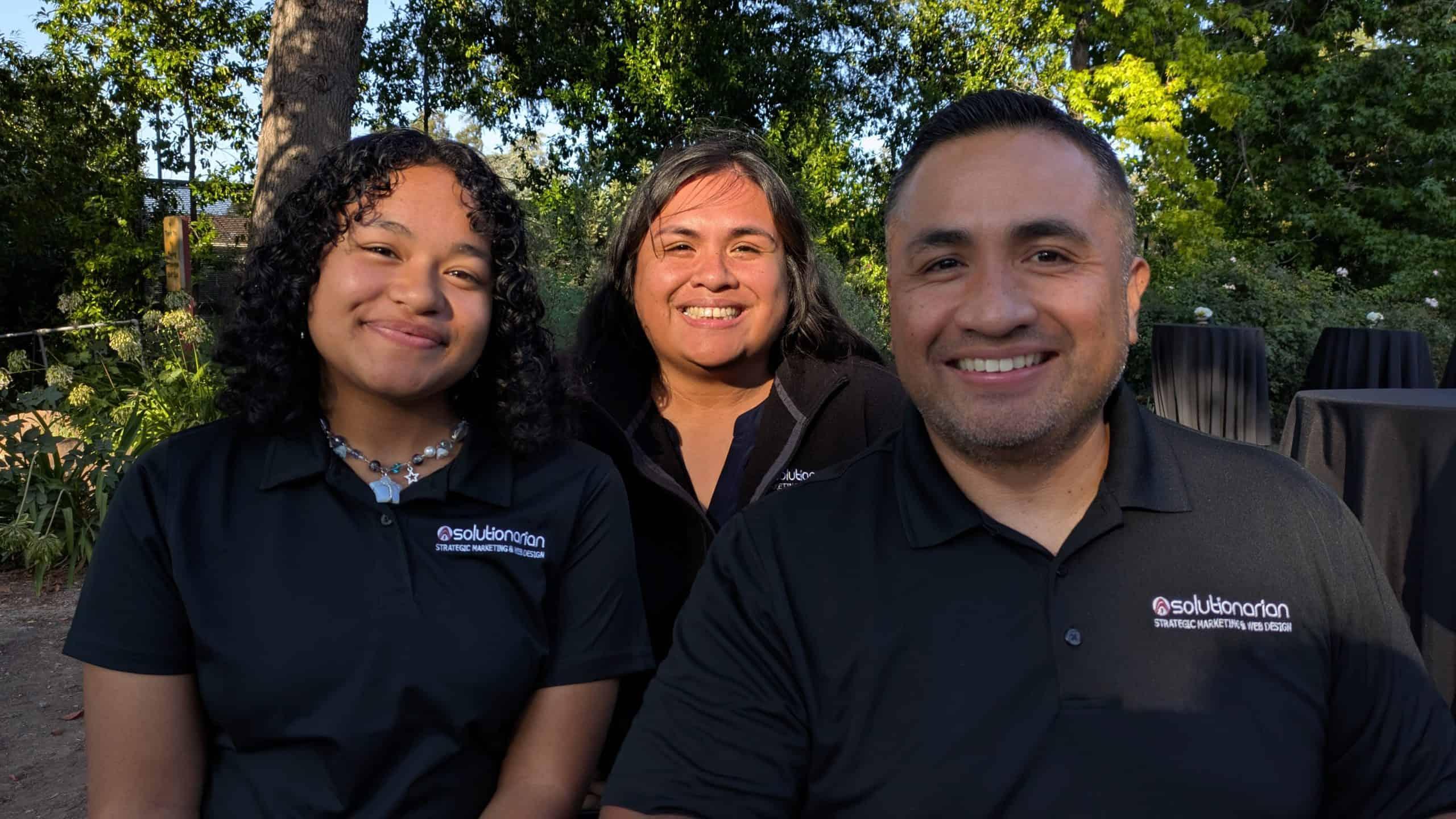 The Solutionarian team in branded polos